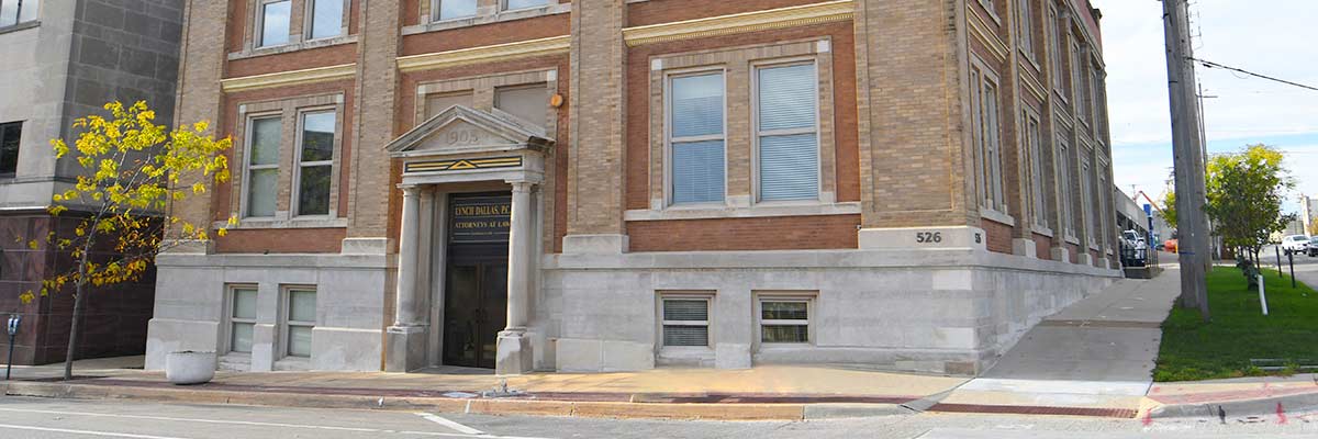 The exterior of the Lynch Dallas buidling with a brick facade